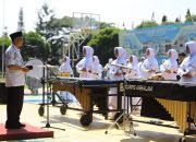 Corps Putri Assalam Berlaga di Kejuaraan Marching Band Internasional Piala Raja Hamengku Buwono 2025.