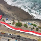 Foto udara momen luar biasa saat sang saka merah putih membentang 300 M di Pantai Karanghawu