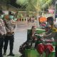 Polres Kepulauan Seribu Bagikan Masker kepada Warga dan Wisatawan, Antisipasi Paparan Debu Vulkanik Erupsi Anak Krakatau